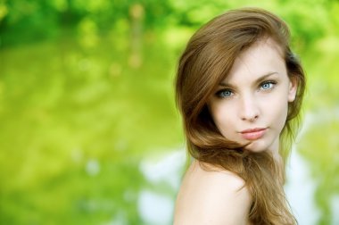 portrait beautiful young woman on green background clipart