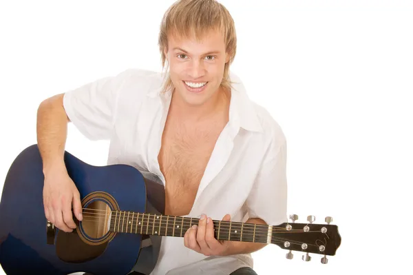 Young man plays guitar — Stock Photo, Image