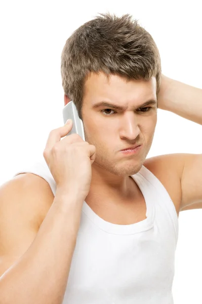 Jeune homme parlant sur un téléphone portable — Photo