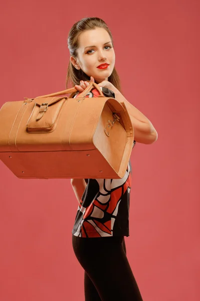 Girl with a big bag — Stock Photo, Image