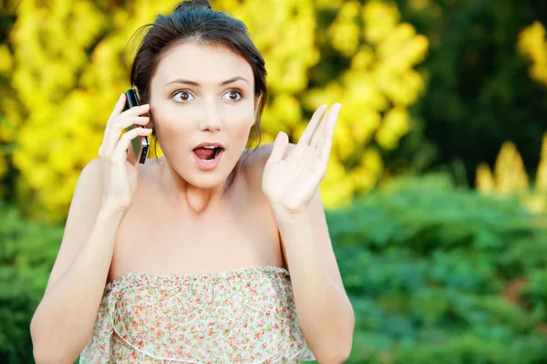 Woman said by cell phone — Stock Photo, Image