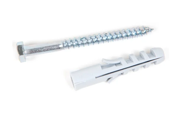 Buchas e parafusos metálicos sobre fundo branco — Fotografia de Stock