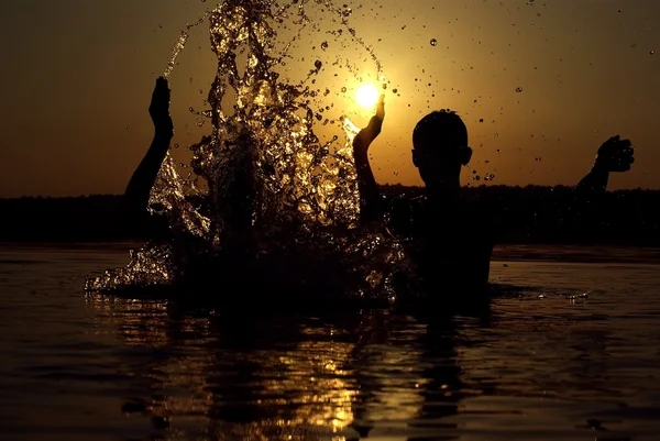 stock image Silhouettes on sunset