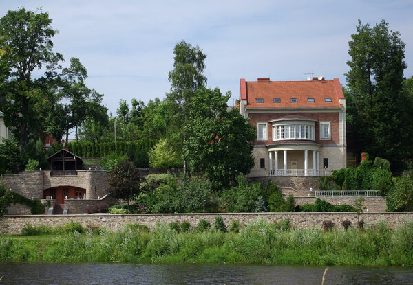 House on river bank of Pskov, Russia