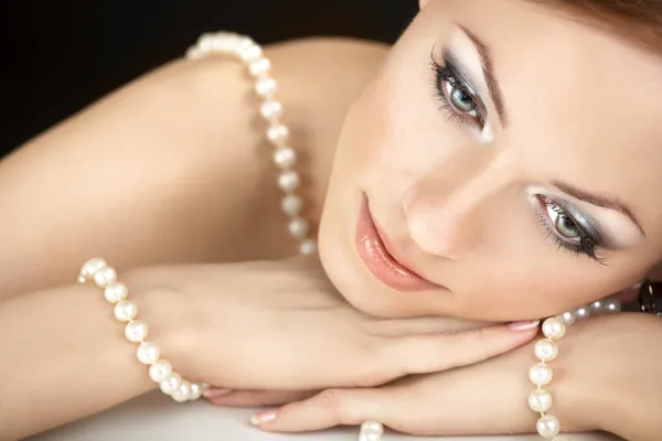 The girl with pearls Stock Photo