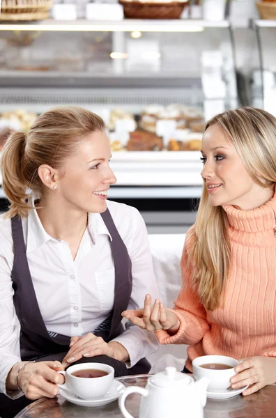 Girlfriends in cafe — Stock Photo, Image