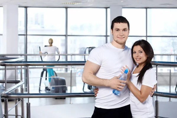Young couple in sports club — Stock Photo, Image