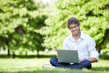 A young man outdoors clipart