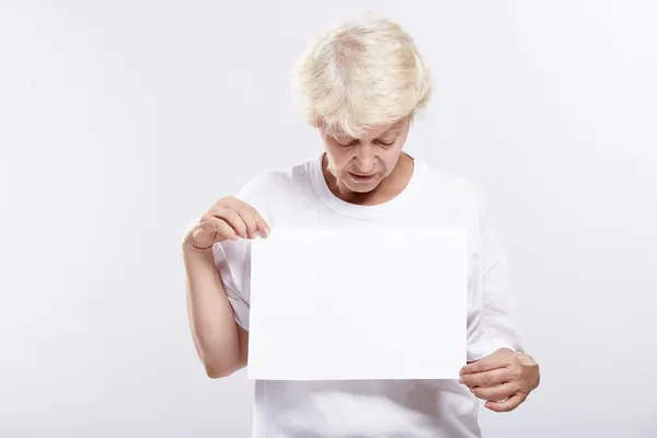 Mature Woman Looking Blank Form White Background — Stock Photo, Image