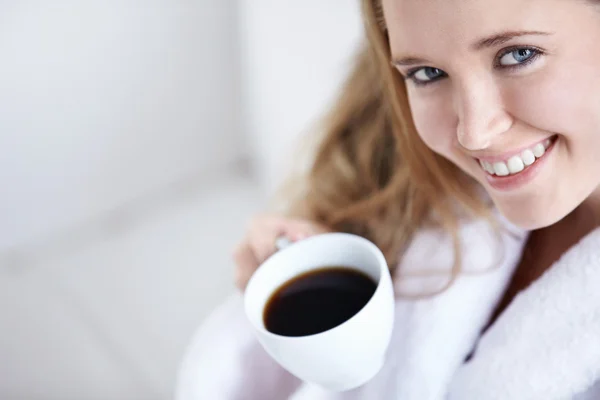 Beautiful girl with a coffee close up — Stock Photo, Image