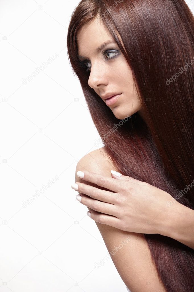 A pretty girl with long hair isolated
