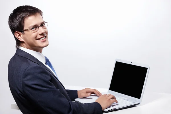 Businessman with a laptop Stock Photo