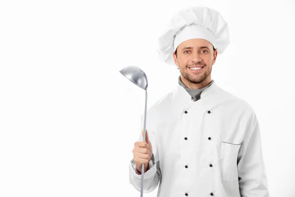 A man with a ladle — Stock Photo, Image