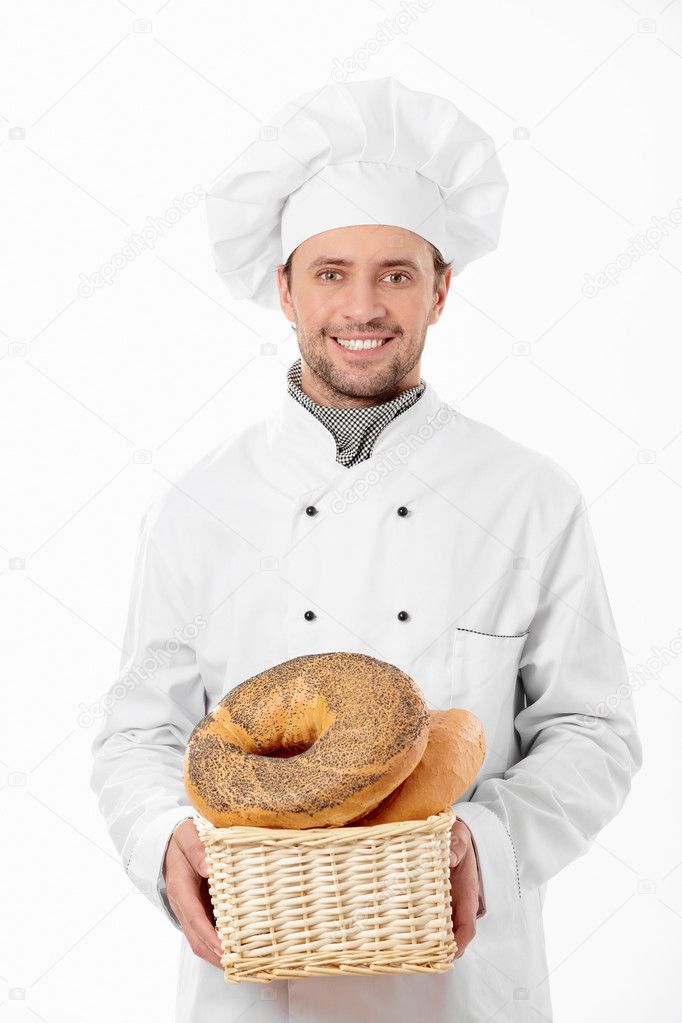 Cook holds a basket of bread