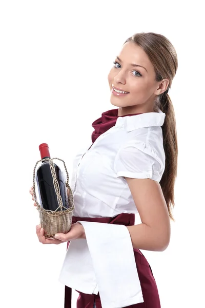 Uma empregada de mesa com uma garrafa de vinho — Fotografia de Stock