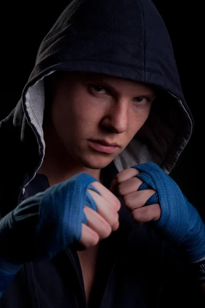 Young man in a hood — Stock Photo, Image