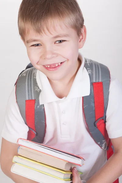Escolar Sonriente Con Libros Mochila — Foto de Stock