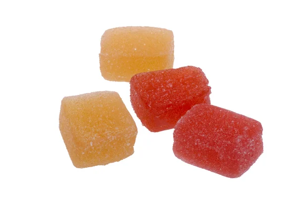 Süße Süßigkeiten auf weißem Hintergrund — Stockfoto
