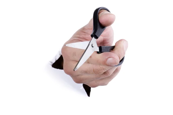Рука на белом с ножницами — стоковое фото
