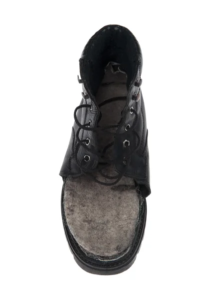 Skadade gamla skor på vit bakgrund — Stockfoto