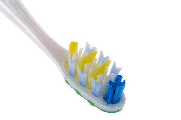 Nesne Üzerinde Beyaz Plastik Diş Fırçası Yakın Çekim — Stok fotoğraf