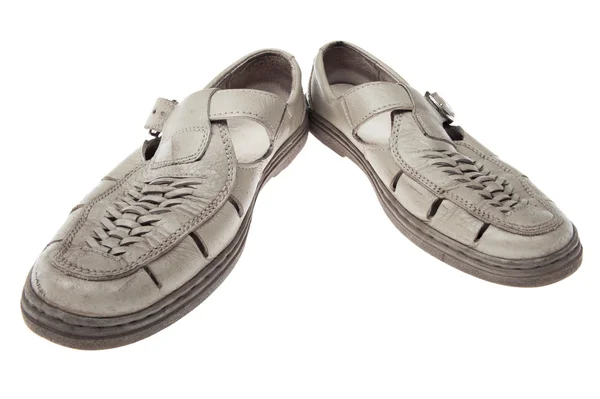 Zapatos viejos en blanco — Foto de Stock
