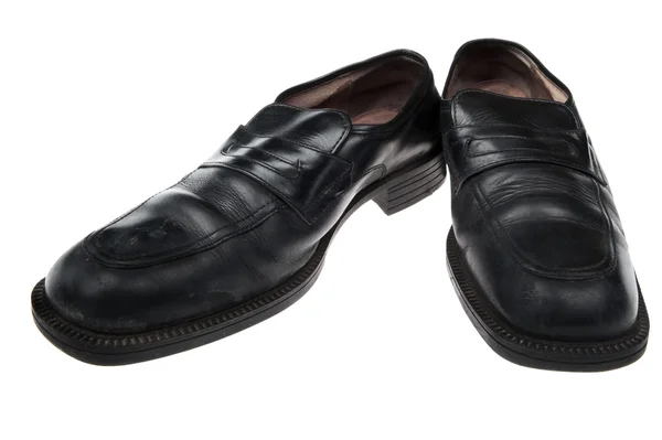 Staré boty na bílém zblízka — Stock fotografie