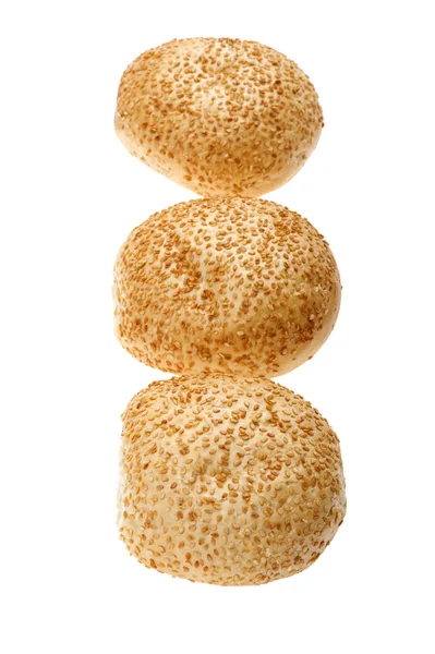 Bun with sesame seeds on white — Stock Photo, Image