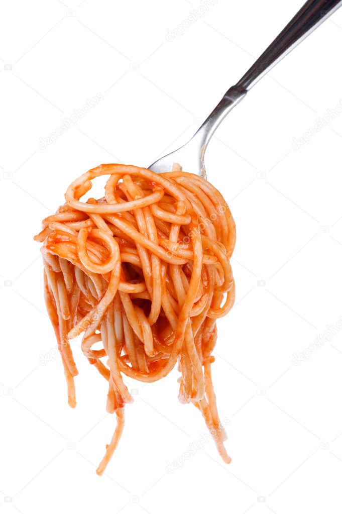 Spaghetti with ketchup on fork close up