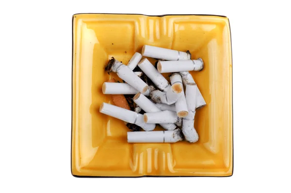 Kül tablası ile sigara izmaritleri makro — Stok fotoğraf