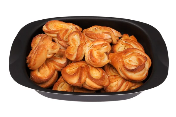 Rolls in the pan on white — Stock Photo, Image
