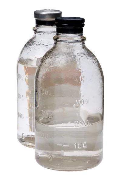 Стеклянная медицинская бутылка — стоковое фото
