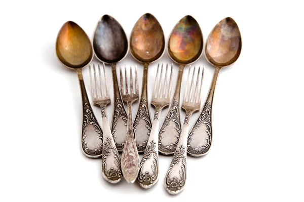 Starožitné stříbrné lžíce a vidlička — Stock fotografie