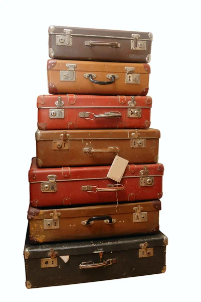Högen av misshandlade gamla resväskor Stockbild