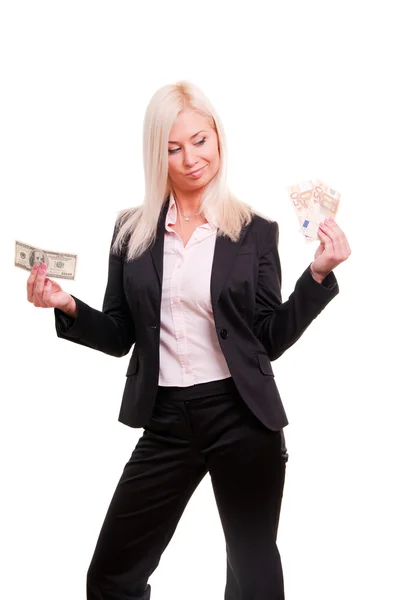 Молодая деловая женщина держит евро в одной руке и доллары в другой — стоковое фото