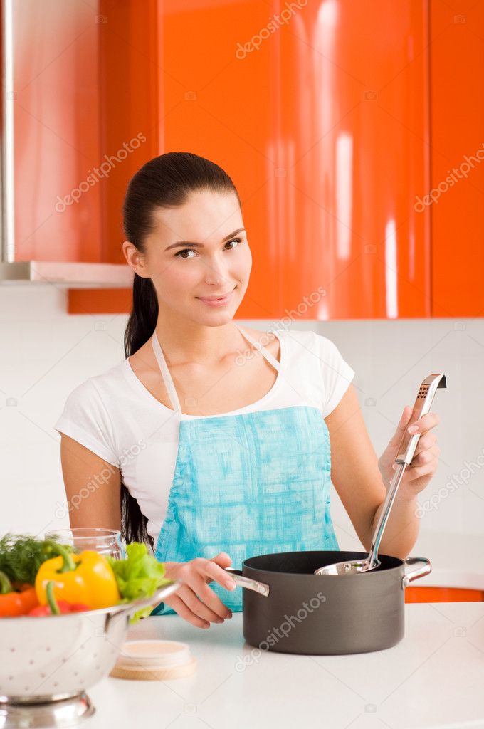 Beautiful Young Woman Cooking In The Kitchen Tasting Soup — Stock