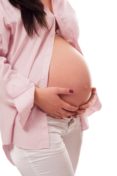 Mulher grávida segurando barriga — Fotografia de Stock