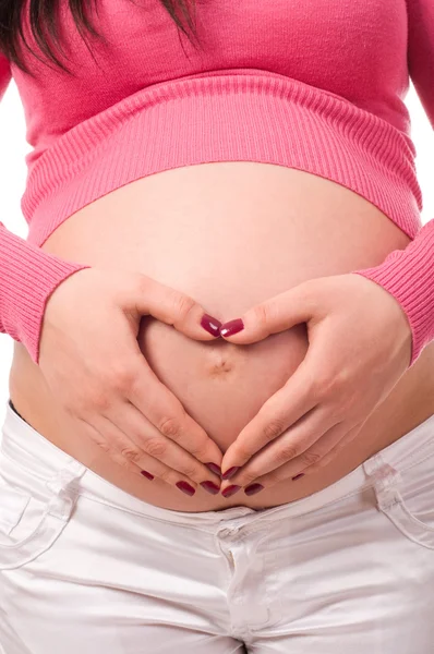 Mujer embarazada sosteniendo vientre — Foto de Stock