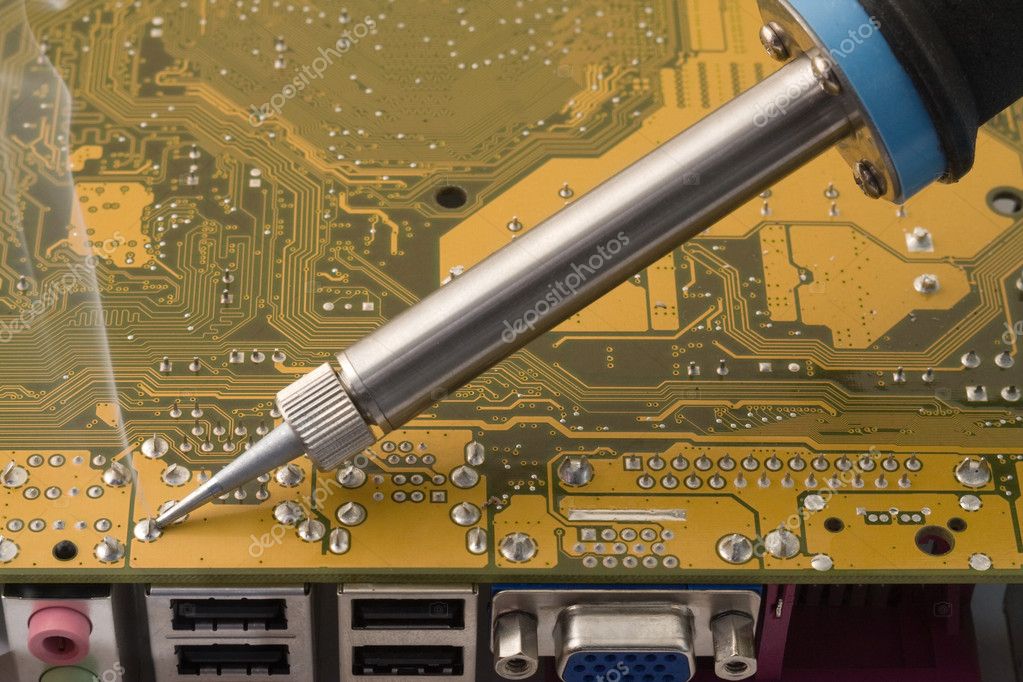 Soldering a circuit board — Stock Photo © Ohotnik 4623448