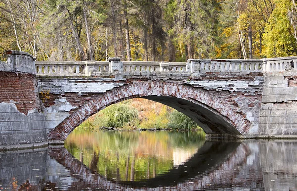 stock image Ruined bridge over the river