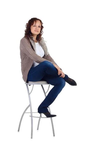 Girl sitting on the bar chair — Stock Photo, Image