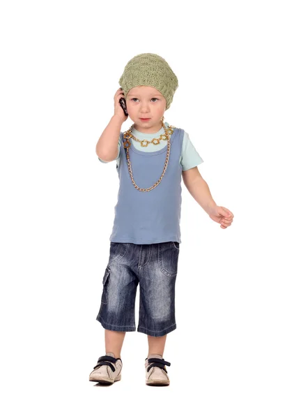 Kleine jongen praten door de telefoon — Stockfoto