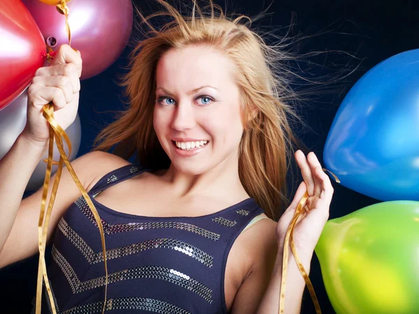 Женщина на вечеринке с шариками Лицензионные Стоковые Фото