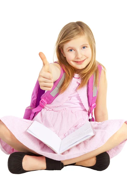 Smiling girl with backpack pointing ok sign over white — Stock Photo, Image