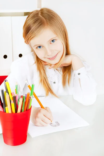 Girl painting picture on table — Stock Photo, Image