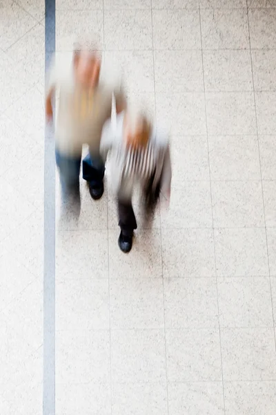Motion blur of walking together — Stock Photo, Image