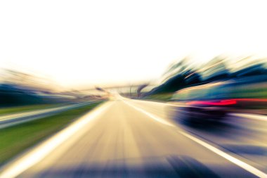 Fast moving car on highway clipart