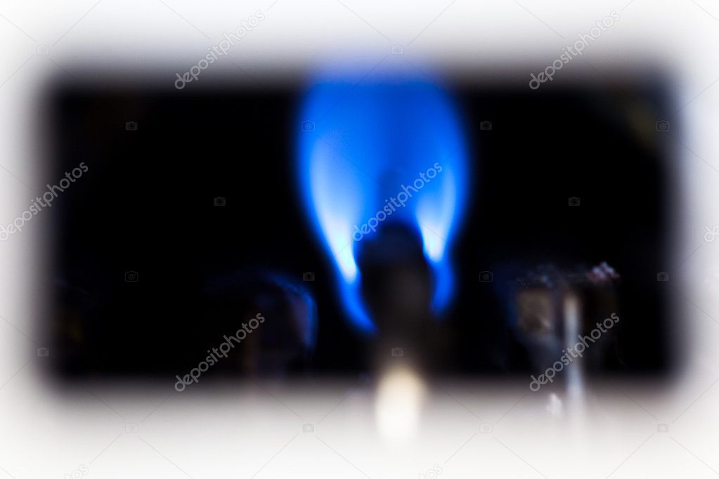 Flame of fire inside of gas oven