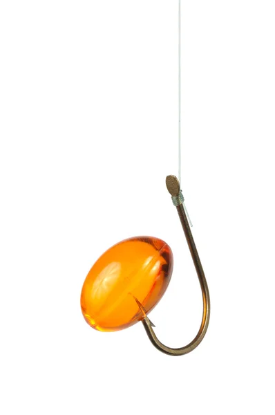 Capsule on a Hook — Stock Photo, Image