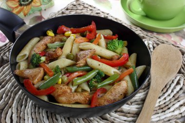 Pasta with chicken and vegetables clipart